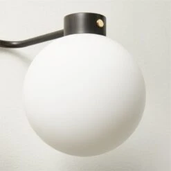 Marra 3-Bulb Black Globe Vanity Light -Home Furnishing Shop MarraBkPldBrs3BlbVntyScncAVSHS23