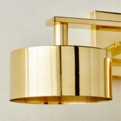 Trada 3-Bulb Polished Brass Wall Sconce Light -Home Furnishing Shop Trada3BlbPlhdBrsWallScncAVSHF23
